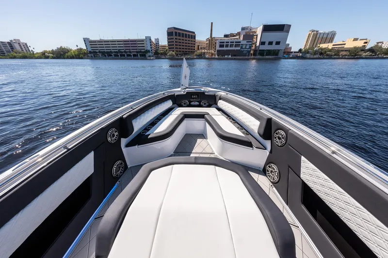  Yacht Photos Pics 2022 Cigarette 41 Nighthawk boat interior with waterfront cityscape background.