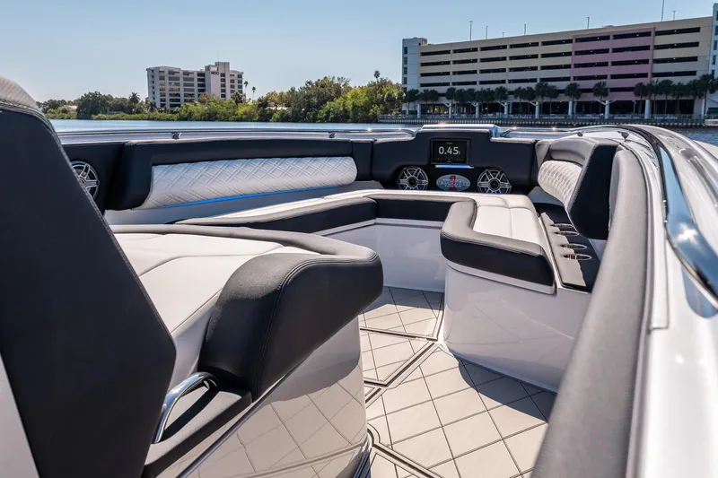  Yacht Photos Pics 2022 Cigarette 41 Nighthawk luxury boat interior with modern seating and dashboard.