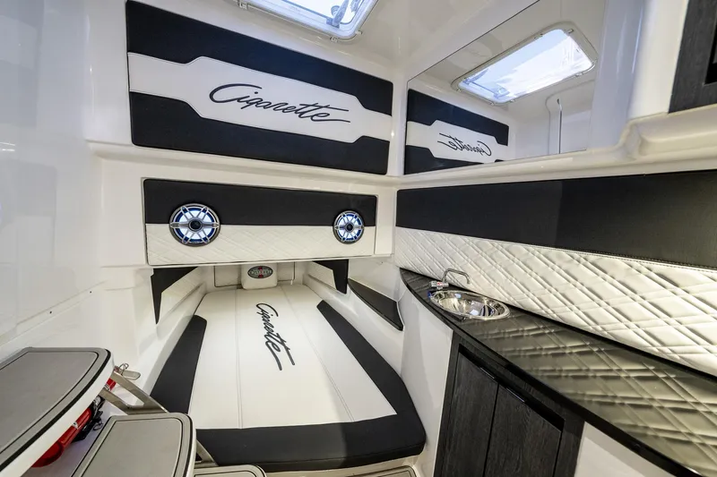  Yacht Photos Pics 2022 Cigarette 41 Nighthawk cabin interior with luxury seating and modern design.