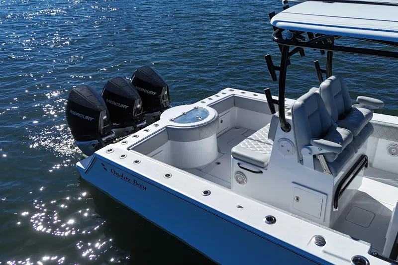  Yacht Photos Pics 2021 Onslow Bay 33 Tournament boat with triple Mercury engines on the water.