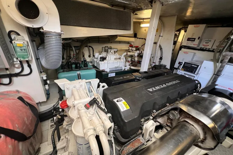  Yacht Photos Pics Engine room of a 2013 Prestige 620 yacht featuring Volvo Penta components.