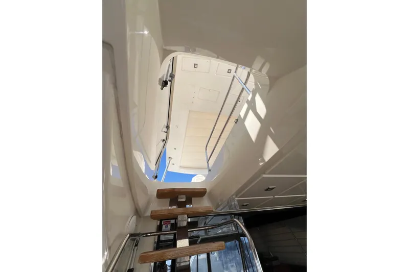  Yacht Photos Pics Staircase leading to the deck of a 2013 Prestige 620 yacht.