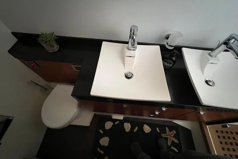  Yacht Photos Pics Modern bathroom in 2013 Prestige 620 yacht with dual sinks and sleek design.