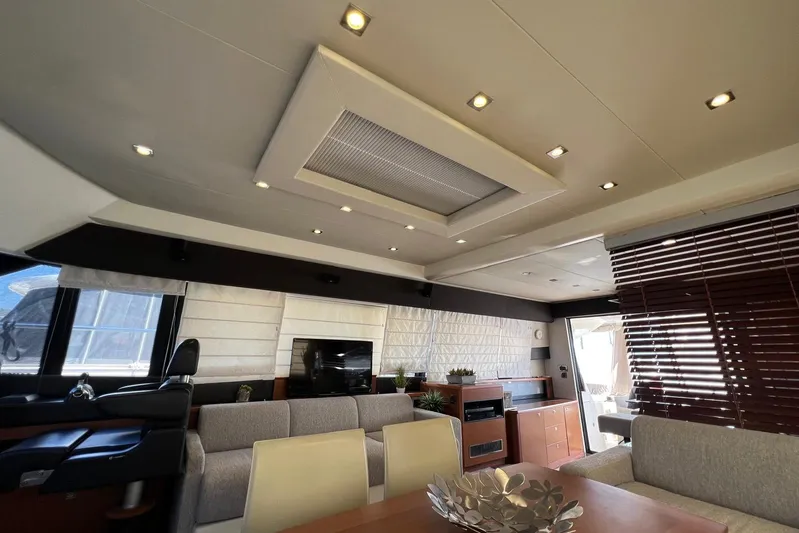  Yacht Photos Pics Luxurious interior of a 2013 Prestige 620 yacht with modern furnishings and elegant lighting.
