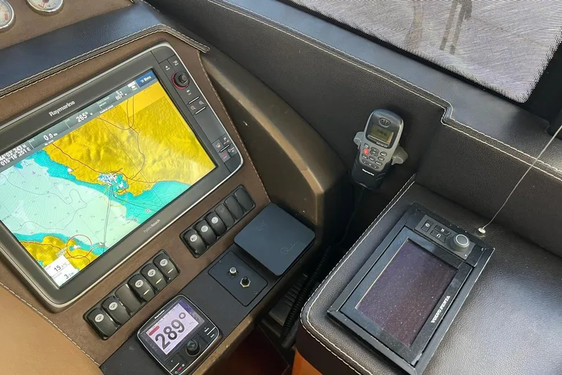  Yacht Photos Pics Control panel of a 2013 Prestige 620 yacht with navigation equipment.