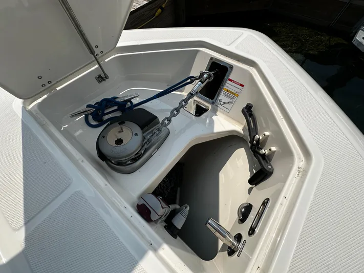  Yacht Photos Pics 2022 Boston Whaler 350 Realm anchor compartment with chain and rope storage.