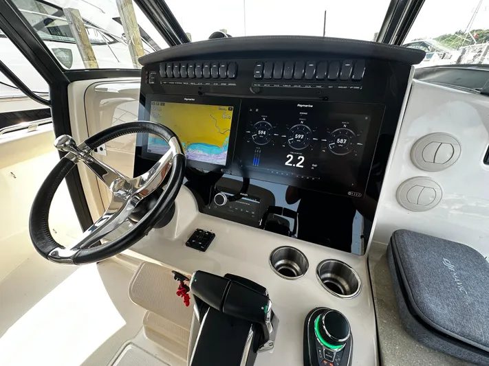  Yacht Photos Pics 2022 Boston Whaler 350 Realm dashboard with navigation and control systems.