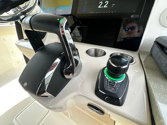  Yacht Photos Pics Control panel of 2022 Boston Whaler 350 Realm boat with throttle and joystick.