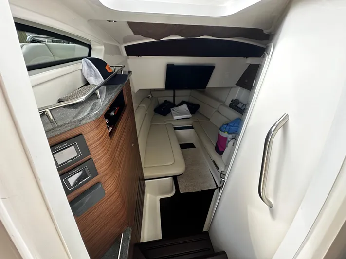  Yacht Photos Pics Interior cabin of 2022 Boston Whaler 350 Realm, featuring modern design and comfortable seating.