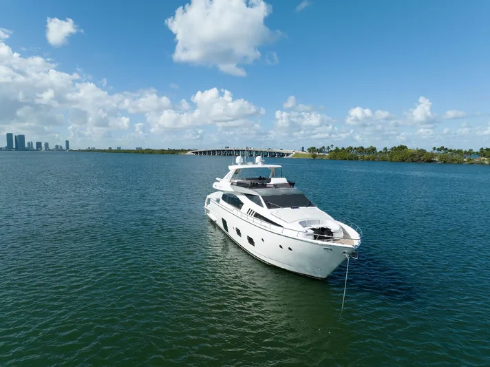 Evolution Yacht Photos Pics Luxurious 2013 Ferretti Yachts 800 cruising on serene blue waters under a clear sky.