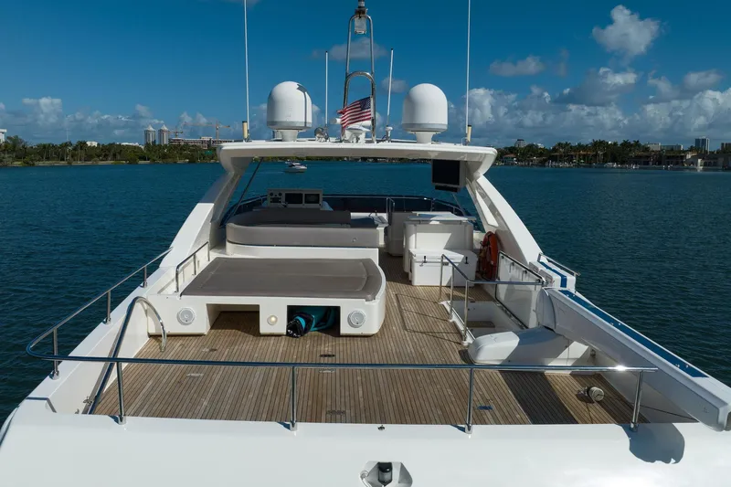 Evolution Yacht Photos Pics 2013 Ferretti Yachts 800 on water, spacious deck, clear sky, luxury boating experience.