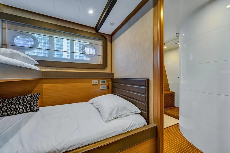 Evolution Yacht Photos Pics Luxurious cabin interior of 2013 Ferretti Yachts 800 with modern design and cozy bedding.