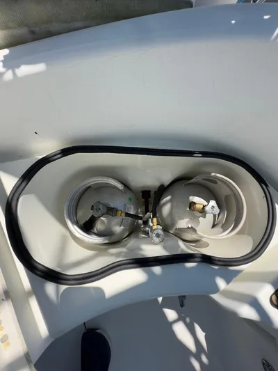  Yacht Photos Pics Beneteau 411 (2000) sailboat gas compartment with two propane tanks.