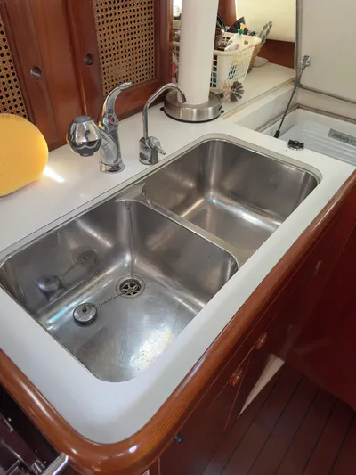  Yacht Photos Pics Stainless steel double sink in a 2000 Beneteau 411 yacht kitchen.