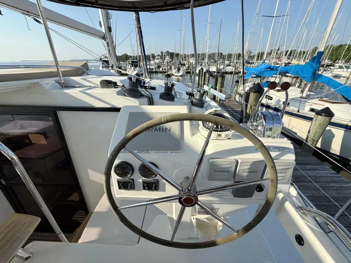Sirena Yacht Photos Pics Helm of 2015 Fountaine Pajot Helia 44 catamaran docked at marina.