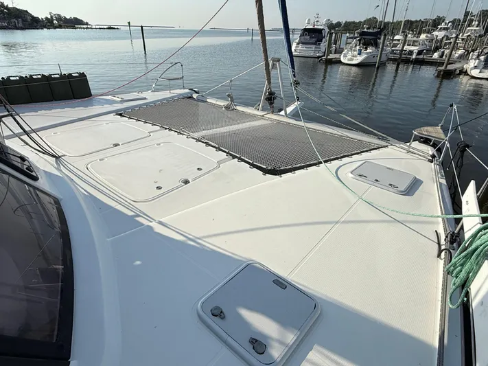Sirena Yacht Photos Pics Deck of 2015 Fountaine Pajot Helia 44 catamaran docked at marina.