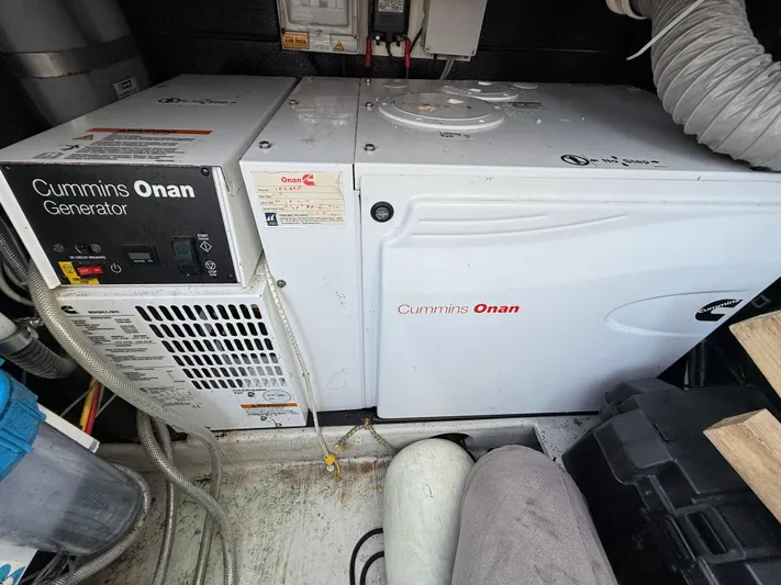 Sirena Yacht Photos Pics Cummins Onan generator in a 2015 Fountaine Pajot Helia 44 yacht engine room.