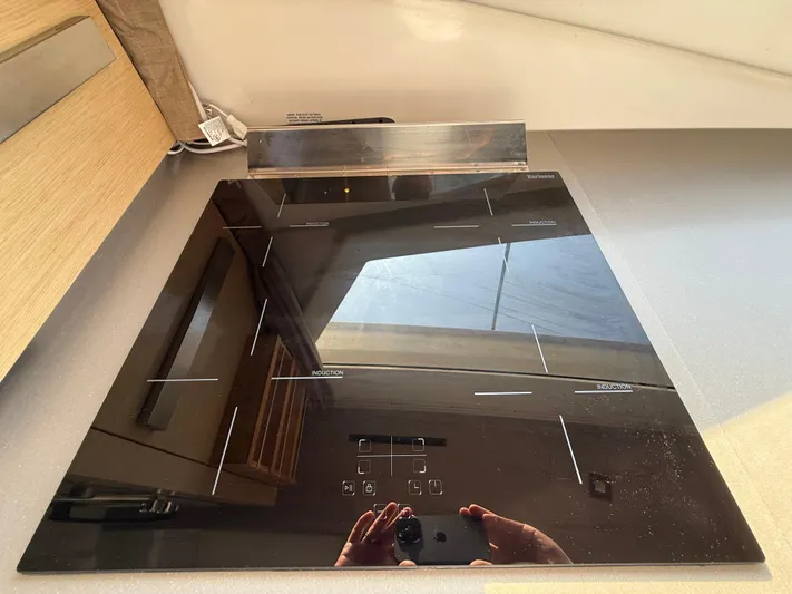 Sirena Yacht Photos Pics Induction cooktop on 2015 Fountaine Pajot Helia 44 yacht kitchen.