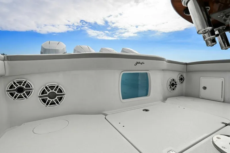  Yacht Photos Pics 2023 Yellowfin 39 Offshore boat interior with speakers and storage compartments.