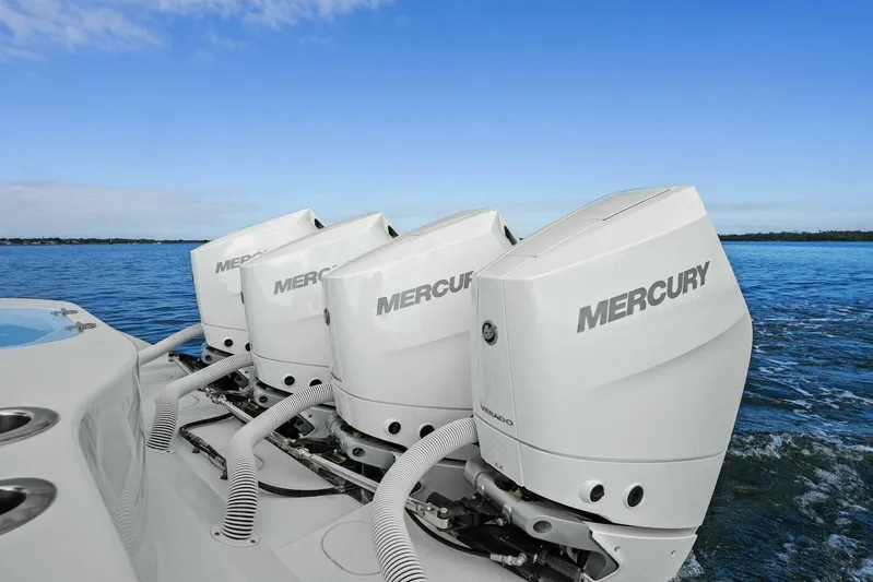  Yacht Photos Pics 2023 Yellowfin 39 Offshore boat with four Mercury outboard engines on open water.