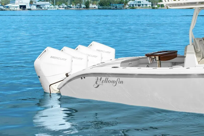 Yacht Photos Pics 2023 Yellowfin 39 Offshore boat with triple Mercury engines on calm water.