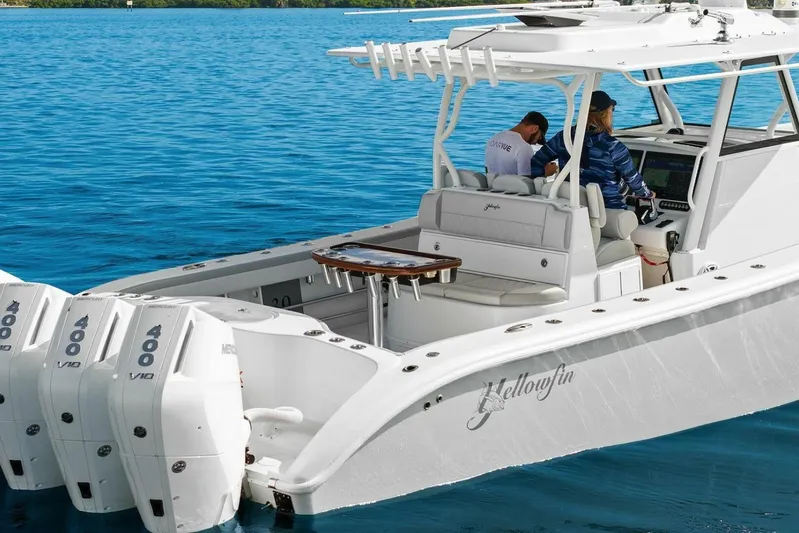  Yacht Photos Pics 2023 Yellowfin 39 Offshore boat with triple 400 V10 engines on blue water.