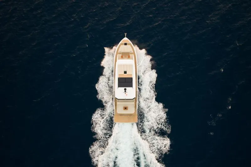  Yacht Photos Pics Aerial view of 2025 De Antonio Yachts D60 cruising on open sea.