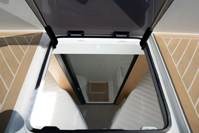  Yacht Photos Pics Hatch view of 2025 De Antonio Yachts D60 interior with modern design elements.