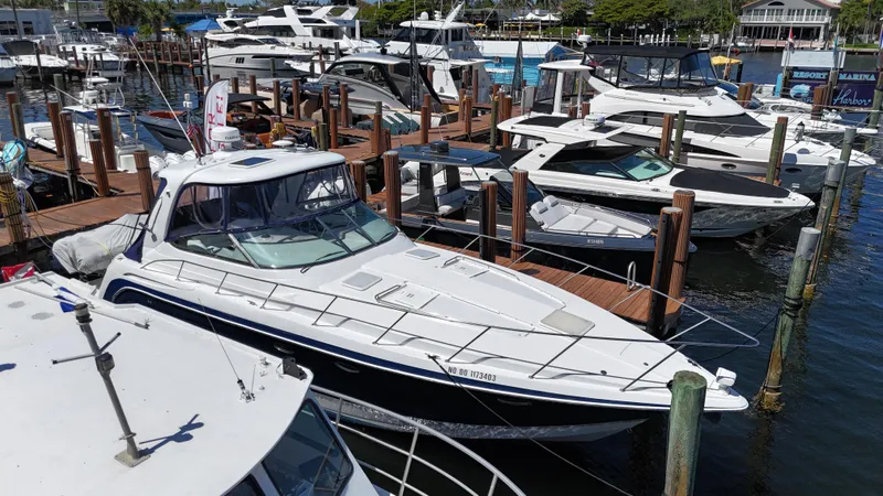  Yacht Photos Pics 2004 Formula 40 PC yacht docked at marina with other boats.