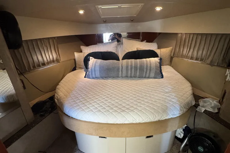  Yacht Photos Pics Luxurious 2004 Formula 40 PC yacht cabin with cozy bed and elegant decor.