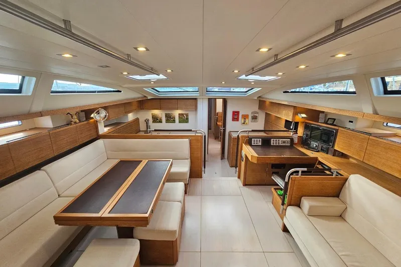 Cnb 60 Yacht Photos Pics Luxurious interior of 2013 CNB BORDEAUX 60 yacht with modern furnishings and ample natural light.