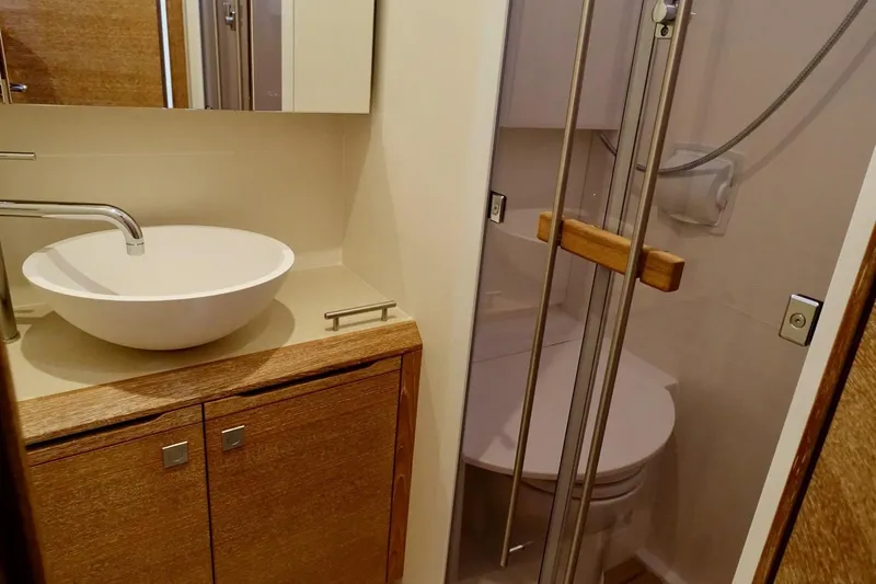 Cnb 60 Yacht Photos Pics Bathroom interior of 2013 CNB BORDEAUX 60 yacht with modern sink and shower.