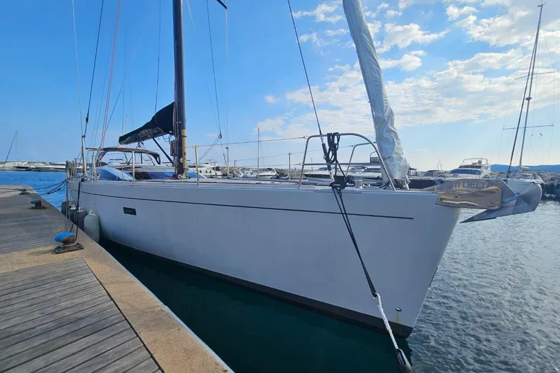 Cnb 60 Yacht Photos Pics Sailing yacht CNB BORDEAUX 60, 2013 model, docked at marina under blue sky.