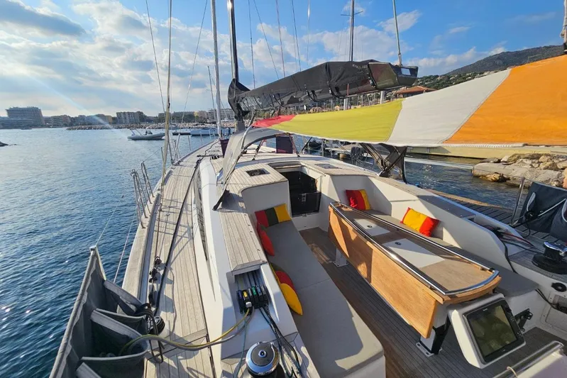 Cnb 60 Yacht Photos Pics Luxurious 2013 CNB BORDEAUX 60 yacht docked, featuring spacious deck and vibrant cushions.