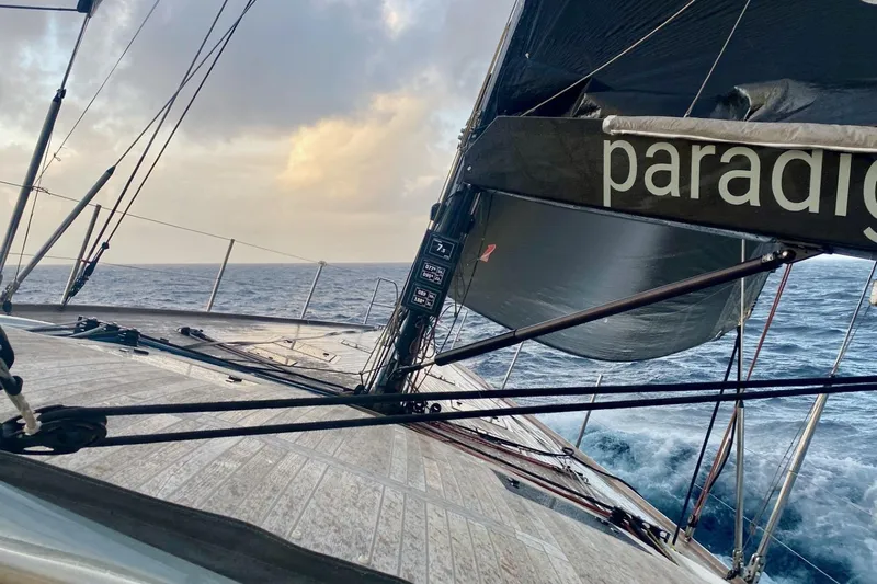 Cnb 60 Yacht Photos Pics Sailing on CNB BORDEAUX 60 yacht, 2013 model, against a dramatic ocean backdrop.