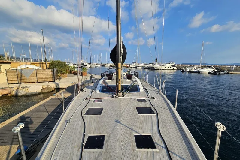 Cnb 60 Yacht Photos Pics Sailing yacht CNB BORDEAUX 60, 2013 model, docked at a marina under a blue sky.