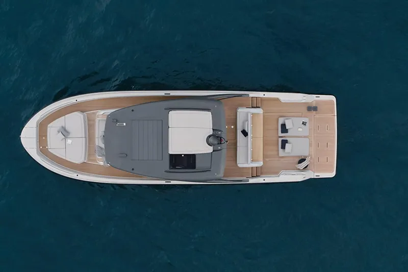 Bluegame Bg54#29 (new) Yacht Photos Pics Aerial view of 2025 Bluegame BG54 yacht on open water.