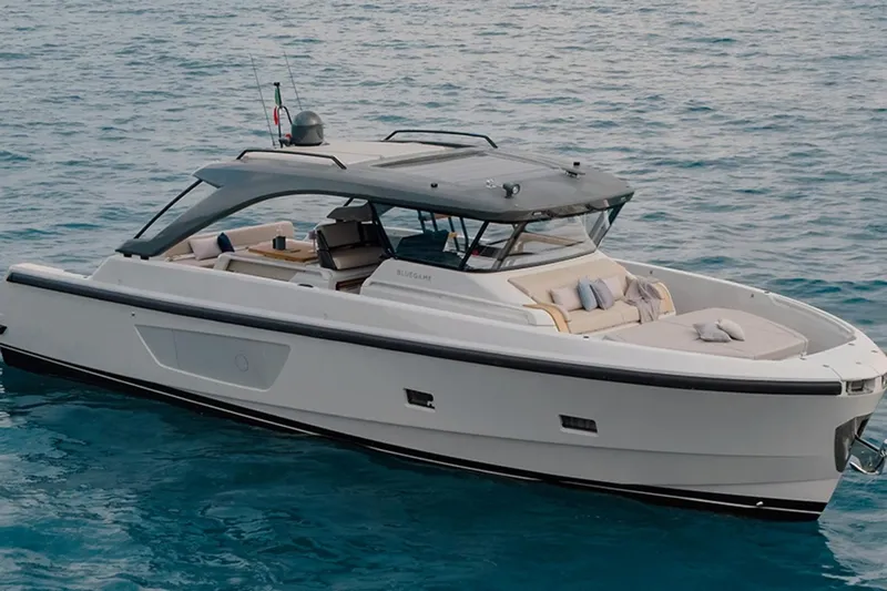 Bluegame Bg54#29 (new) Yacht Photos Pics 2025 Bluegame BG54 luxury yacht cruising on calm blue waters.