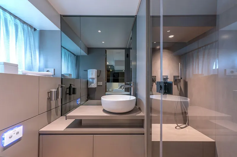 Bluegame Bg54#29 (new) Yacht Photos Pics Modern bathroom interior on Bluegame BG54 yacht, featuring sleek design and elegant fixtures, 2025 model.