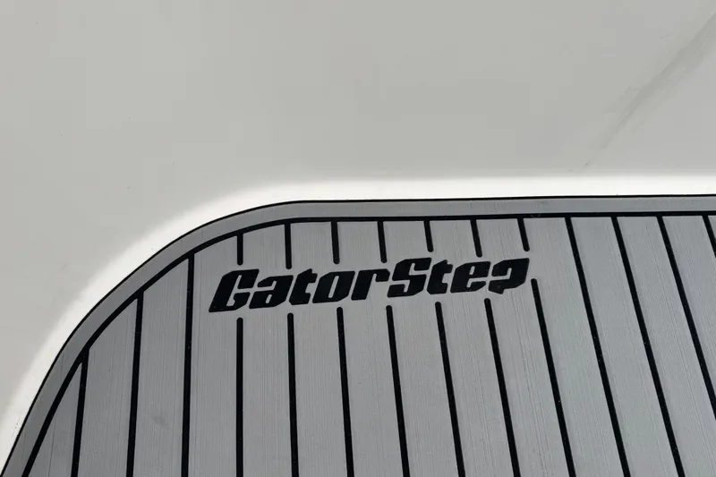  Yacht Photos Pics GatorStep flooring on 2002 Silverton 352 Motor Yacht, featuring sleek, striped design.