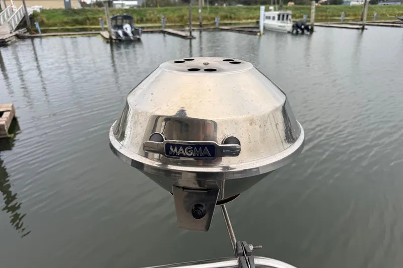 Yacht Photos Pics Stainless steel Magma grill on 2002 Silverton 352 Motor Yacht, docked at marina.