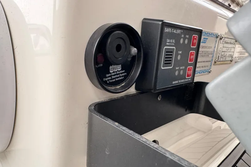  Yacht Photos Pics Control panel on a 2002 Silverton 352 Motor Yacht, featuring safety alert systems.