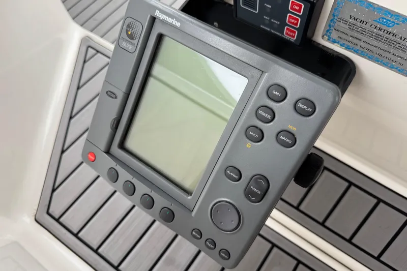  Yacht Photos Pics Raymarine navigation system on 2002 Silverton 352 Motor Yacht dashboard.