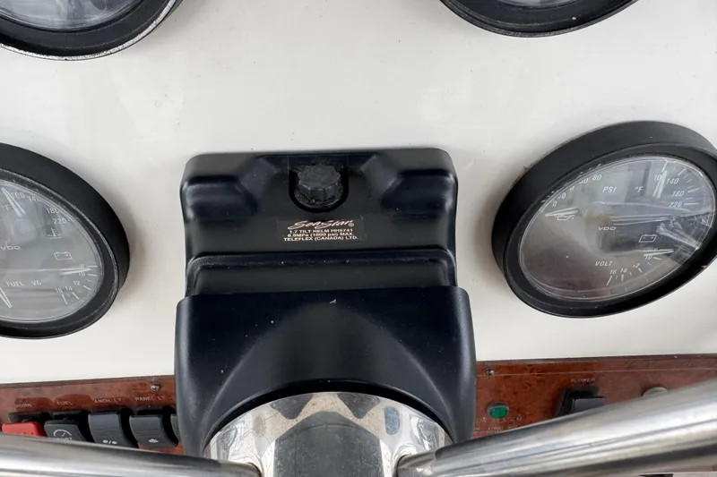  Yacht Photos Pics Control panel of a 2002 Silverton 352 Motor Yacht with gauges and switches.