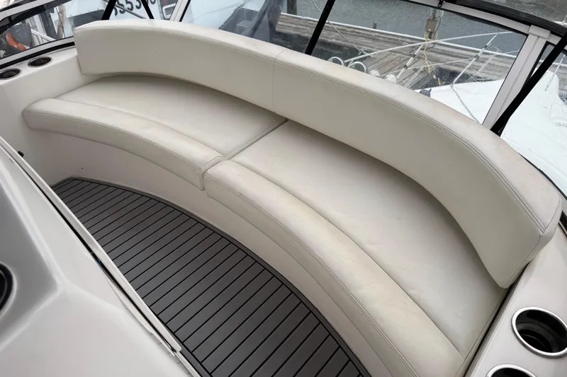 Yacht Photos Pics Luxurious seating on 2002 Silverton 352 Motor Yacht, featuring sleek white upholstery.