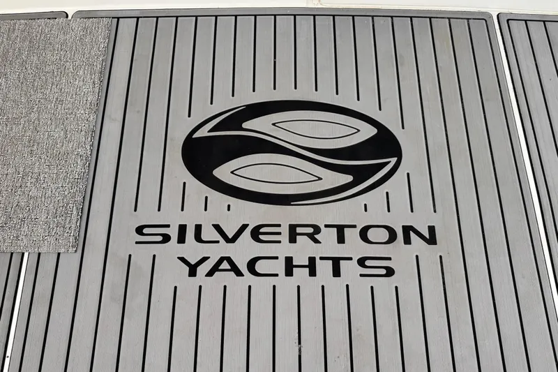  Yacht Photos Pics Silverton Yachts logo on 2002 Silverton 352 Motor Yacht deck.