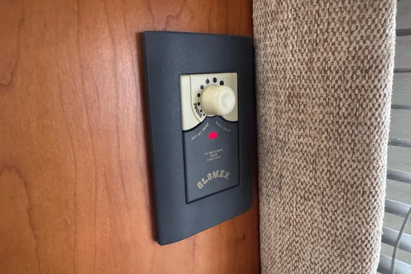  Yacht Photos Pics Glomex antenna control panel on 2002 Silverton 352 Motor Yacht interior wall.