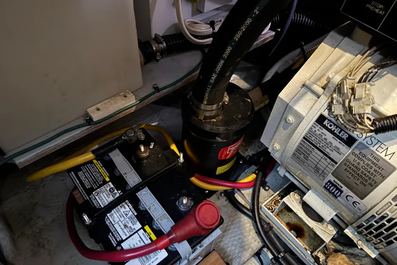  Yacht Photos Pics Engine compartment of 2002 Silverton 352 Motor Yacht with battery and Kohler power system.