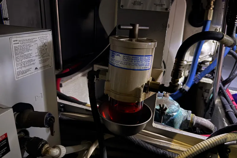  Yacht Photos Pics 2002 Silverton 352 Motor Yacht engine room with diesel fuel filter and water separator.