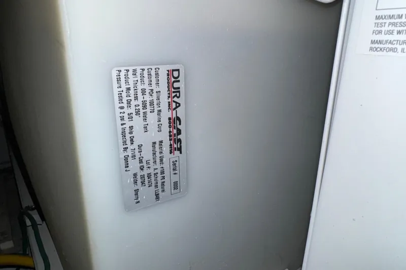  Yacht Photos Pics 2002 Silverton 352 Motor Yacht water tank label, Dura-Cast product details visible.